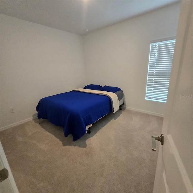200 Citrine Loop, Kissimmee, FL 34758 - carpeted bedroom with baseboards