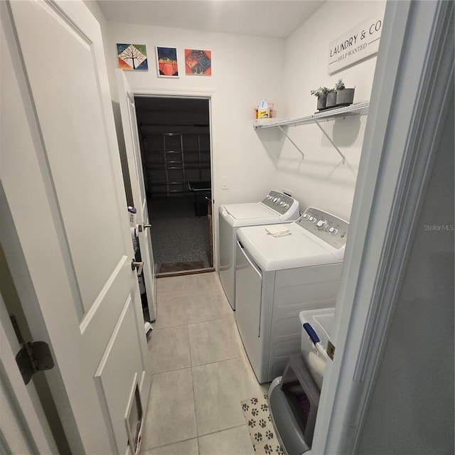 200 Citrine Loop, Kissimmee, FL 34758 - laundry room featuring independent washer and dryer and light tile patterned floors