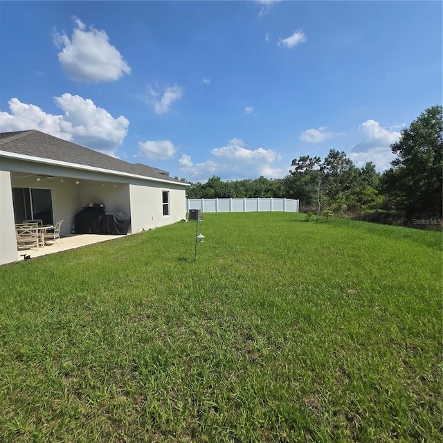 200 Citrine Loop, Kissimmee, FL 34758 - view of yard with a patio area
