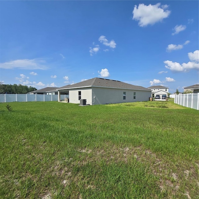 200 Citrine Loop, Kissimmee, FL 34758 - view of yard with central air condition unit