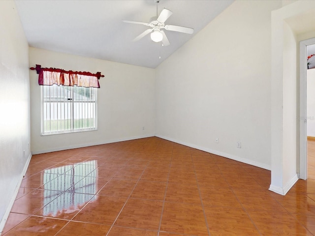 3811 Gator Bay Ln, Saint Cloud, FL 34772 - tiled spare room featuring lofted ceiling, ceiling fan, and baseboards