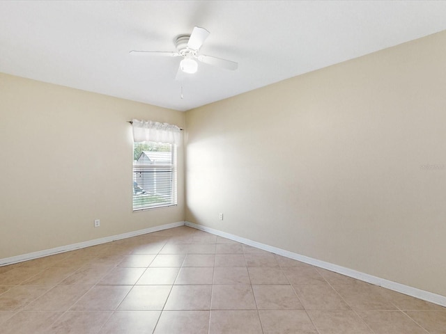 3811 Gator Bay Ln, Saint Cloud, FL 34772 - unfurnished room with ceiling fan, light tile patterned floors, and baseboards