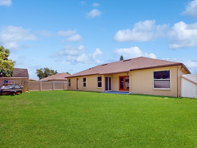 3811 Gator Bay Ln, Saint Cloud, FL 34772 - rear view of property with stucco siding and french doors