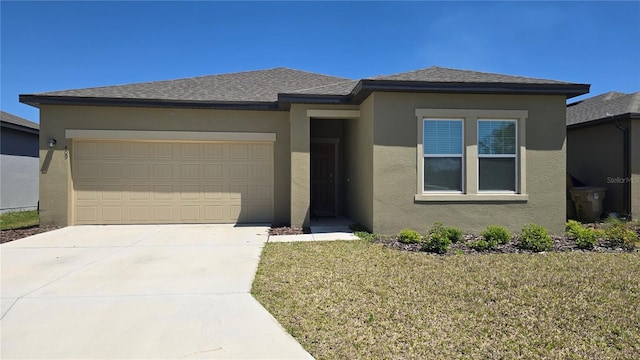 409 Conway Ave, Saint Cloud, FL 34771 - prairie-style house with an attached garage, concrete driveway, stucco siding, a front lawn, and a shingled roof