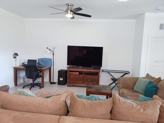 409 Conway Ave, Saint Cloud, FL 34771 - living room with light tile patterned flooring and a ceiling fan