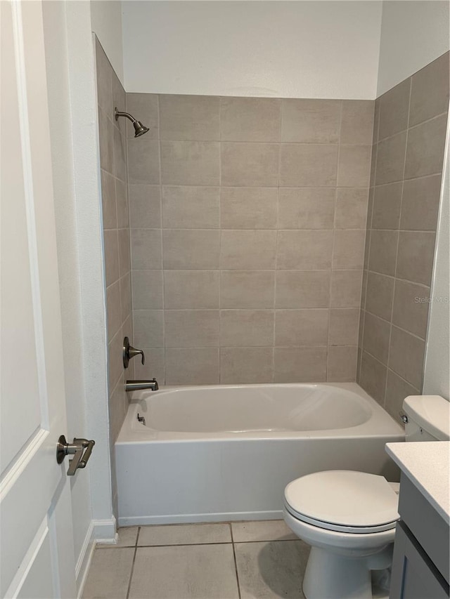4053 Redbridge Loop, Davenport, FL 33837 - bathroom with toilet, tile patterned flooring, vanity, and shower / bathtub combination