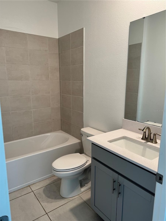4053 Redbridge Loop, Davenport, FL 33837 - full bath with vanity, toilet, tile patterned flooring, and shower / tub combination