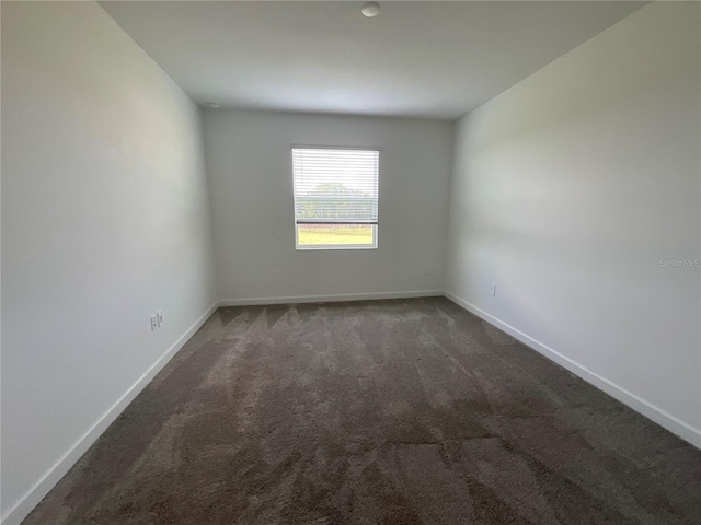 4053 Redbridge Loop, Davenport, FL 33837 - empty room featuring carpet and baseboards