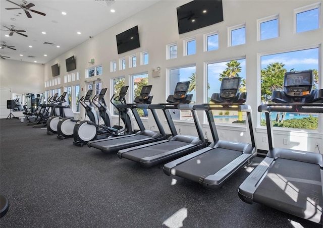 4053 Redbridge Loop, Davenport, FL 33837 - workout area featuring a high ceiling, ceiling fan, and recessed lighting