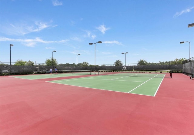 4053 Redbridge Loop, Davenport, FL 33837 - view of tennis court with community basketball court