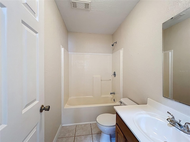 2409 E Magnolia St, Lakeland, FL 33801 - full bath featuring toilet, vanity, tile patterned floors, and shower / bathtub combination
