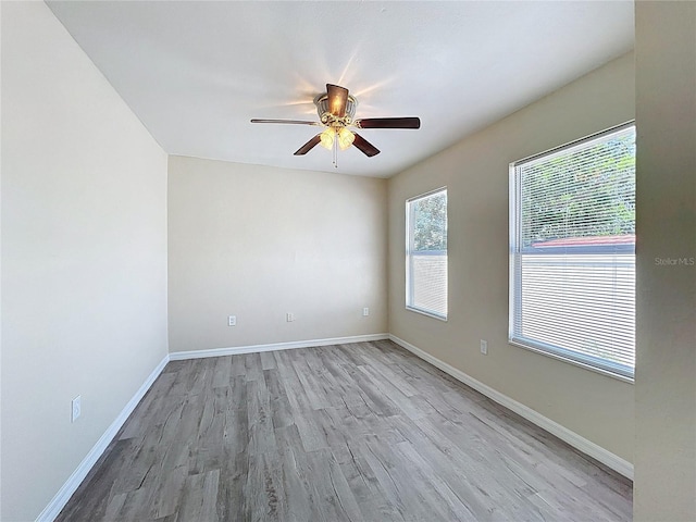 2409 E Magnolia St, Lakeland, FL 33801 - spare room with healthy amount of natural light, a ceiling fan, and light wood finished floors