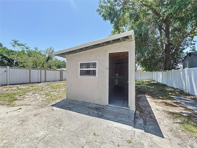 2409 E Magnolia St, Lakeland, FL 33801 - view of outbuilding with a fenced backyard