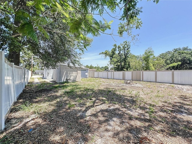 2409 E Magnolia St, Lakeland, FL 33801 - view of yard featuring an outbuilding