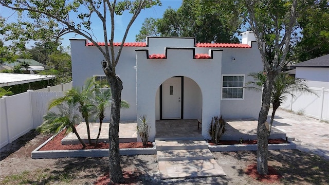 2409 E Magnolia St, Lakeland, FL 33801 - view of front facade featuring stucco siding and a tile roof