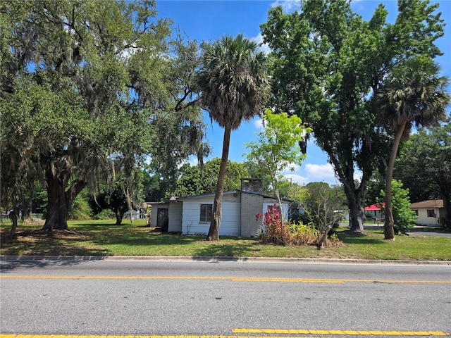 2704 Sample St, Kissimmee, FL 34744 - view of front of home featuring a front yard