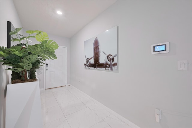 454 Hamlet Loop, Davenport, FL 33837 - hall with light marble finish floors, baseboards, and recessed lighting