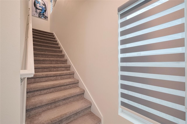 454 Hamlet Loop, Davenport, FL 33837 - stairway featuring radiator