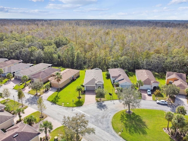 1703 Encinitas Way, Kissimmee, FL 34759 - aerial perspective of suburban area with a heavily wooded area