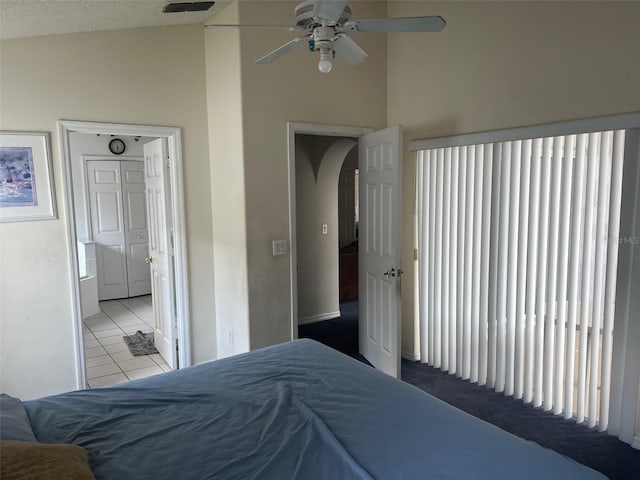 123 S Roma Way, Kissimmee, FL 34746 - tiled bedroom with arched walkways and lofted ceiling