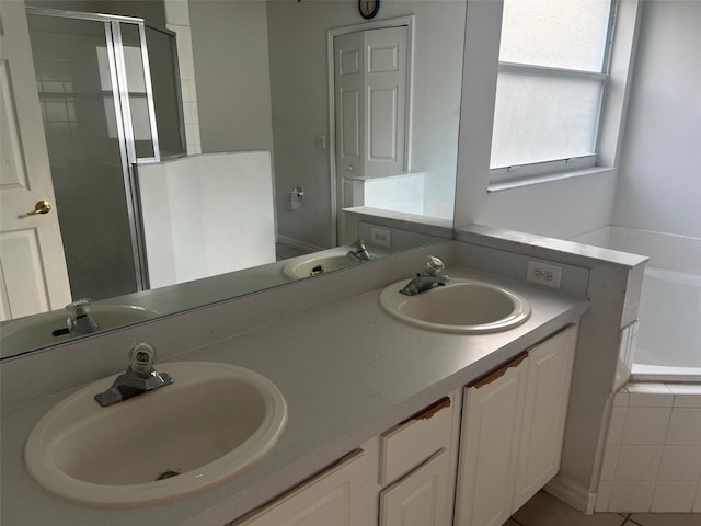 123 S Roma Way, Kissimmee, FL 34746 - full bath with a garden tub, a stall shower, and double vanity