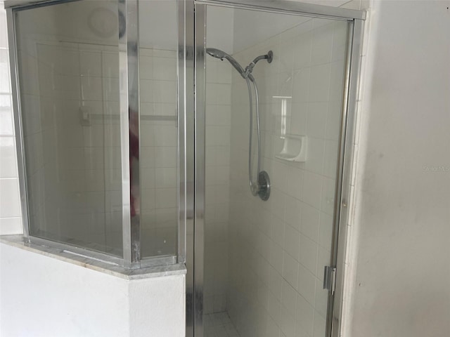 123 S Roma Way, Kissimmee, FL 34746 - bathroom featuring a stall shower