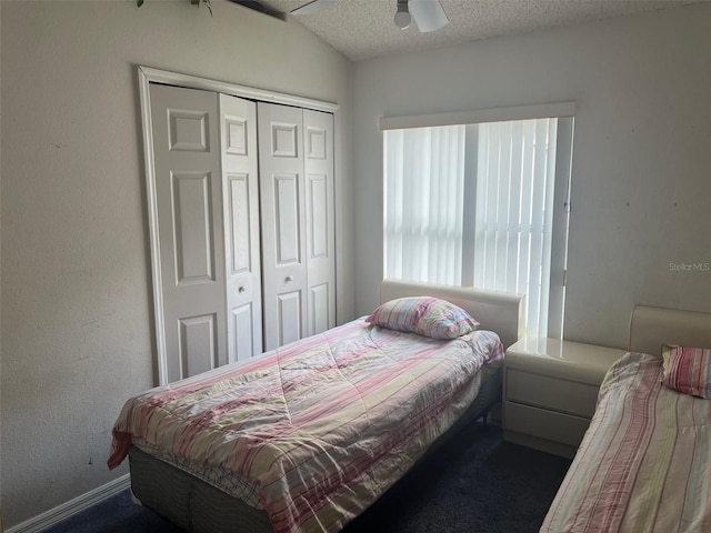 123 S Roma Way, Kissimmee, FL 34746 - bedroom featuring a closet, a textured ceiling, carpet flooring, and a ceiling fan