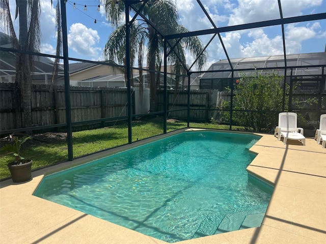 123 S Roma Way, Kissimmee, FL 34746 - view of pool featuring a fenced backyard, a patio, and a lanai