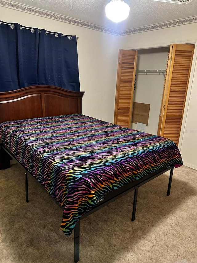 12322 Alta Mira St, North Port, FL 34287 - bedroom featuring carpet, a closet, and a textured ceiling