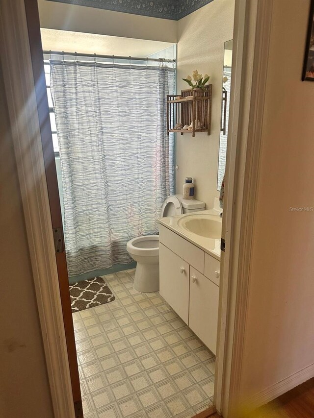 12322 Alta Mira St, North Port, FL 34287 - full bathroom with vanity, toilet, and shower / bath combo