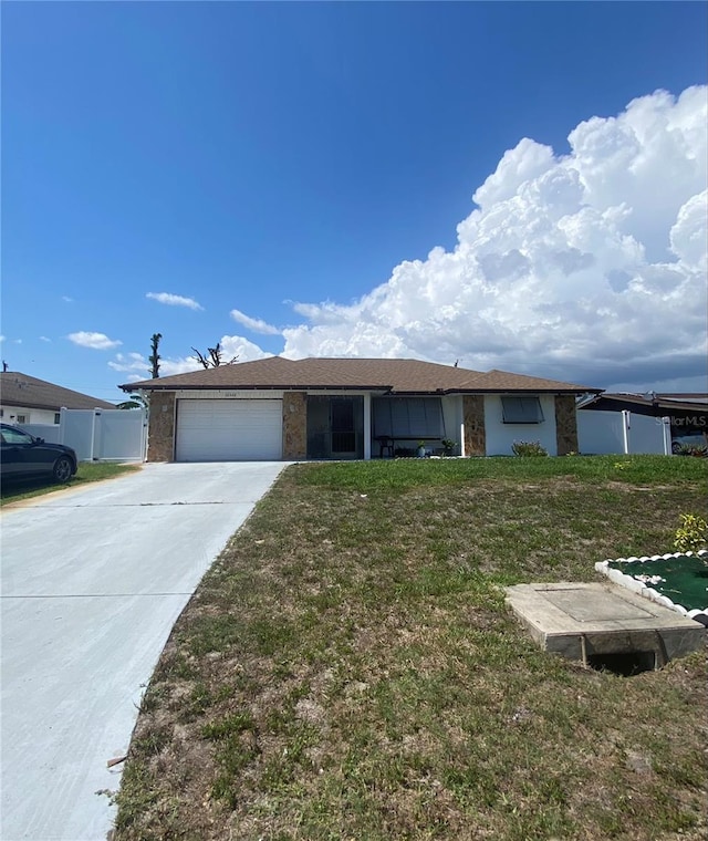 12322 Alta Mira St, North Port, FL 34287 - single story home featuring an attached garage and concrete driveway