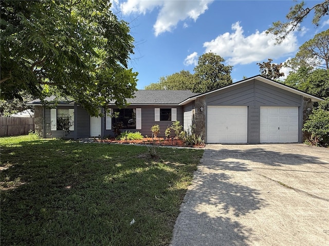 6489 Creation St, Saint Cloud, FL 34771 - view of front of house featuring driveway and a garage