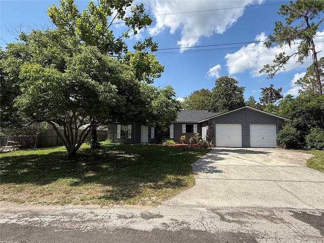 6489 Creation St, Saint Cloud, FL 34771 - view of front facade featuring a garage and driveway