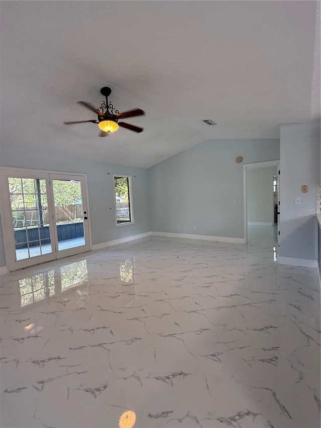 6489 Creation St, Saint Cloud, FL 34771 - unfurnished room featuring a ceiling fan, baseboards, vaulted ceiling, and light marble finish flooring