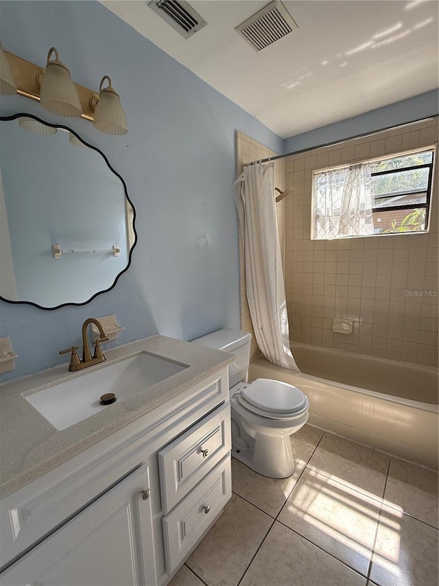6489 Creation St, Saint Cloud, FL 34771 - full bathroom with vanity, tile patterned floors, shower / tub combo with curtain, and toilet