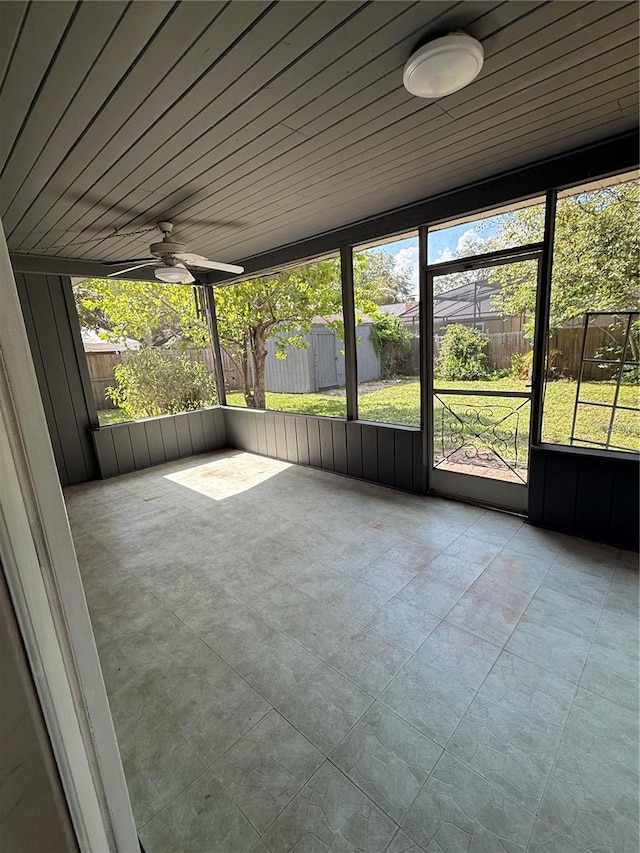 6489 Creation St, Saint Cloud, FL 34771 - unfurnished sunroom featuring a ceiling fan