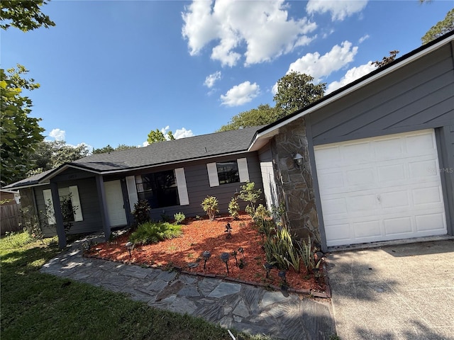 6489 Creation St, Saint Cloud, FL 34771 - single story home featuring stone siding, a garage, and concrete driveway