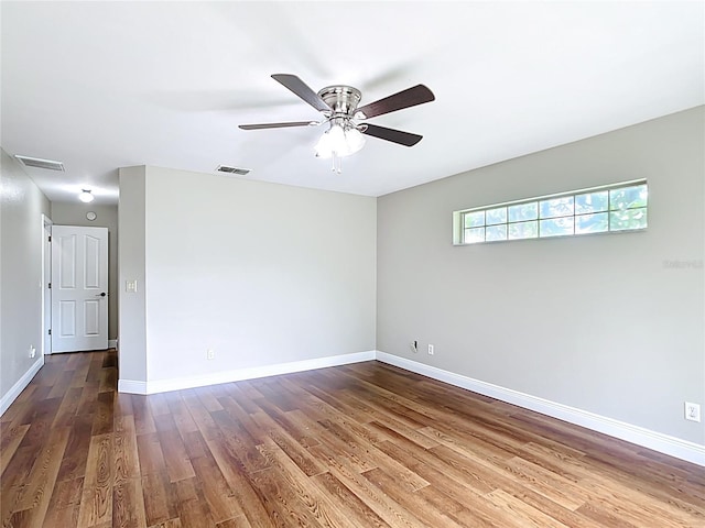 30 Lake Diamond Ave, Ocala, FL 34472 - spare room featuring wood finished floors, baseboards, and ceiling fan