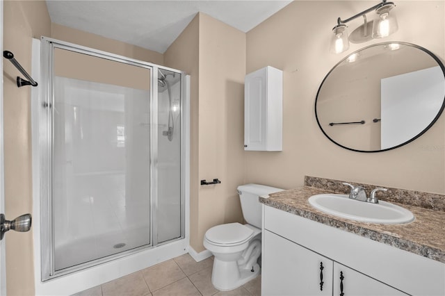 710 Carlton Ave, Lake Wales, FL 33853 - full bath featuring tile patterned floors, vanity, a stall shower, toilet, and baseboards