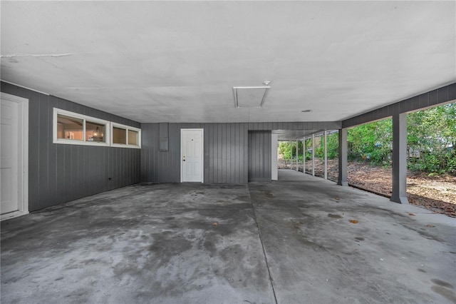 710 Carlton Ave, Lake Wales, FL 33853 - garage featuring an attached carport
