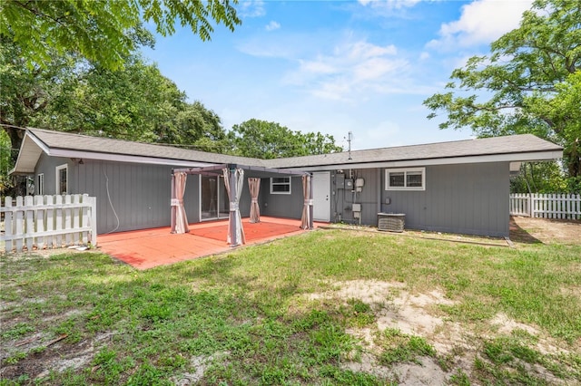 710 Carlton Ave, Lake Wales, FL 33853 - rear view of house featuring a patio area and central AC