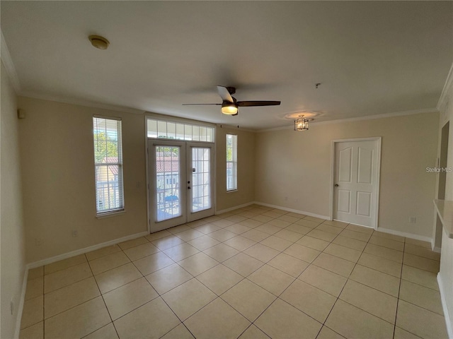 1020 Siena Park Blvd W Unit 304, Kissimmee, FL 34747 - spare room featuring ornamental molding, a ceiling fan, french doors, light tile patterned floors, and baseboards
