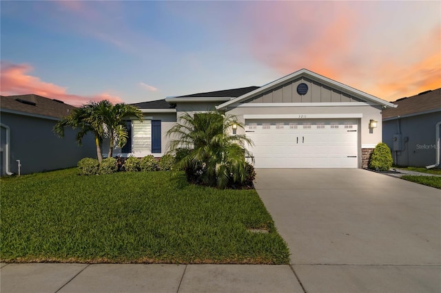 3211 Sweet Acres Pl, Saint Cloud, FL 34772 - single story home featuring driveway, a front lawn, an attached garage, and stucco siding