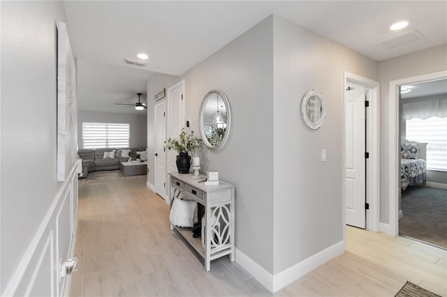 3211 Sweet Acres Pl, Saint Cloud, FL 34772 - corridor featuring baseboards, light wood finished floors, and recessed lighting
