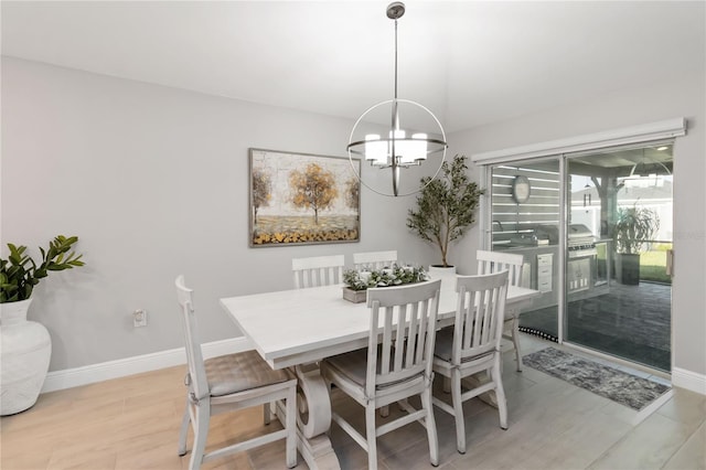 3211 Sweet Acres Pl, Saint Cloud, FL 34772 - dining area with a chandelier and baseboards