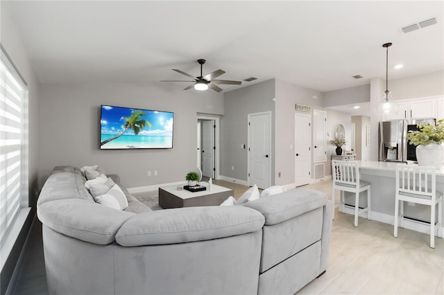 3211 Sweet Acres Pl, Saint Cloud, FL 34772 - living area with a ceiling fan, lofted ceiling, baseboards, and recessed lighting