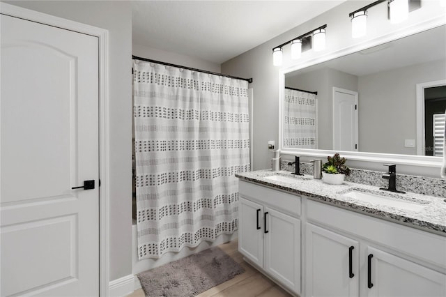 3211 Sweet Acres Pl, Saint Cloud, FL 34772 - bathroom with double vanity and a shower with shower curtain