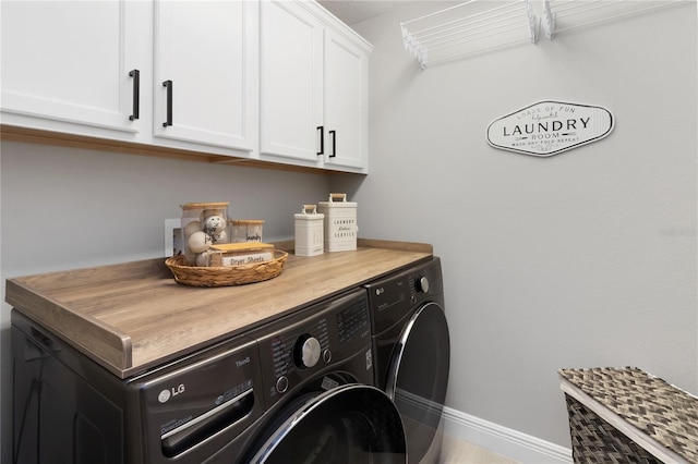 3211 Sweet Acres Pl, Saint Cloud, FL 34772 - laundry room featuring washing machine and dryer, cabinet space, and baseboards