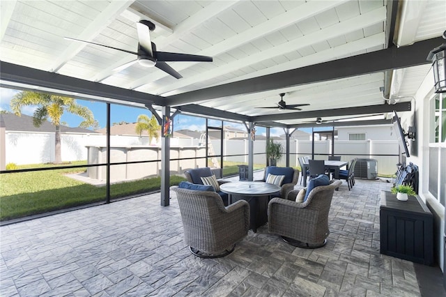 3211 Sweet Acres Pl, Saint Cloud, FL 34772 - sunroom / solarium with ceiling fan, outdoor dining area, and beam ceiling