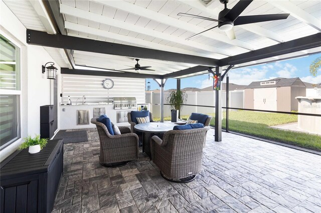 3211 Sweet Acres Pl, Saint Cloud, FL 34772 - view of patio featuring a ceiling fan, outdoor dining space, and a sink